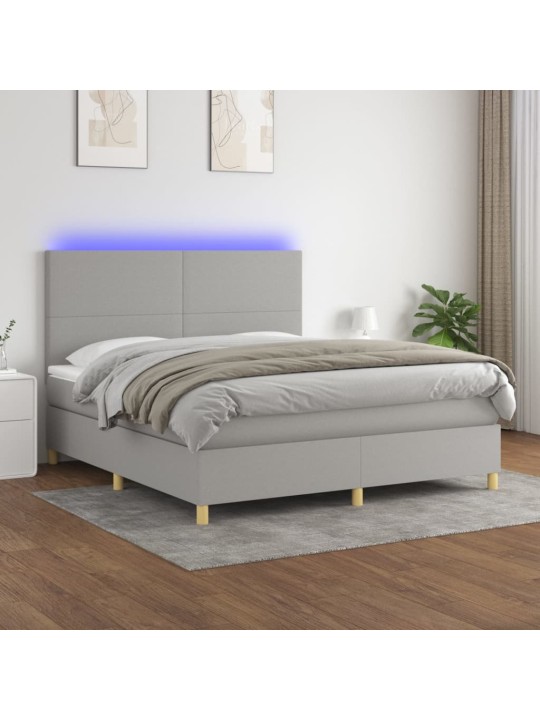 Box spring postel s matrací a LED světle šedá 180x200 cm textil