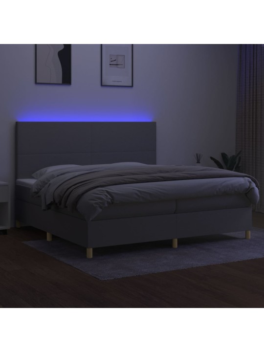 Box spring postel s matrací a LED světle šedá 200x200 cm textil