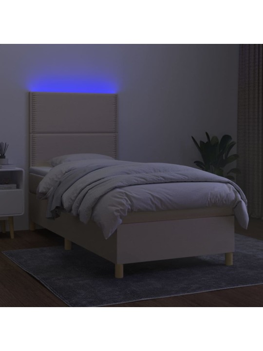 Box spring postel s matrací a LED krémová 90x200 cm textil