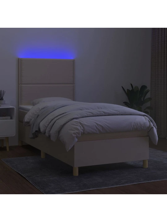Box spring postel s matrací a LED krémová 90x200 cm textil