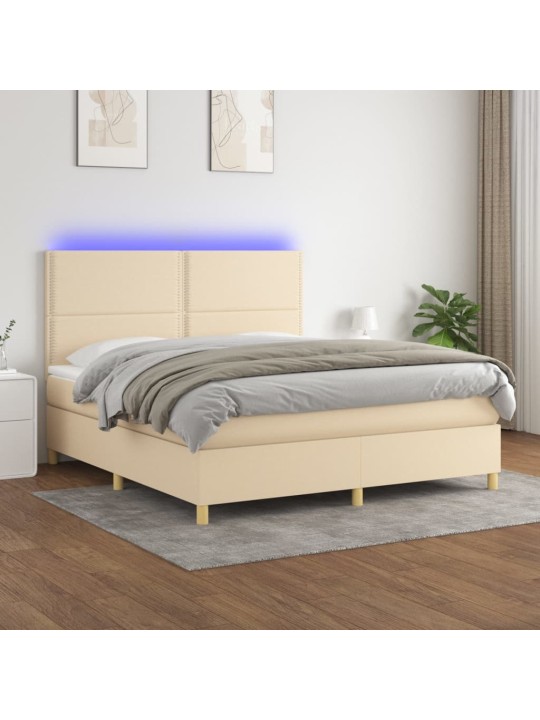 Box spring postel s matrací a LED krémová 180x200 cm textil