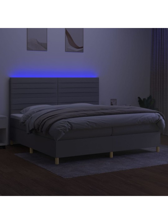 Box spring postel s matrací a LED světle šedá 200x200 cm textil