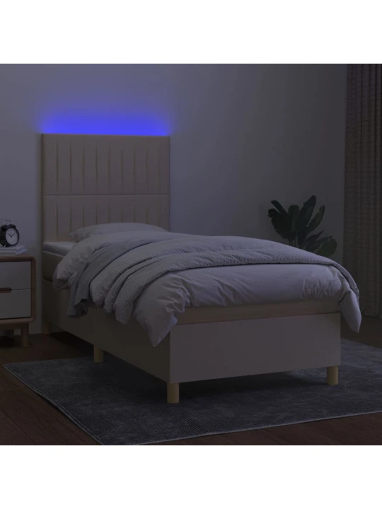 Box spring postel s matrací a LED krémová 90x200 cm textil