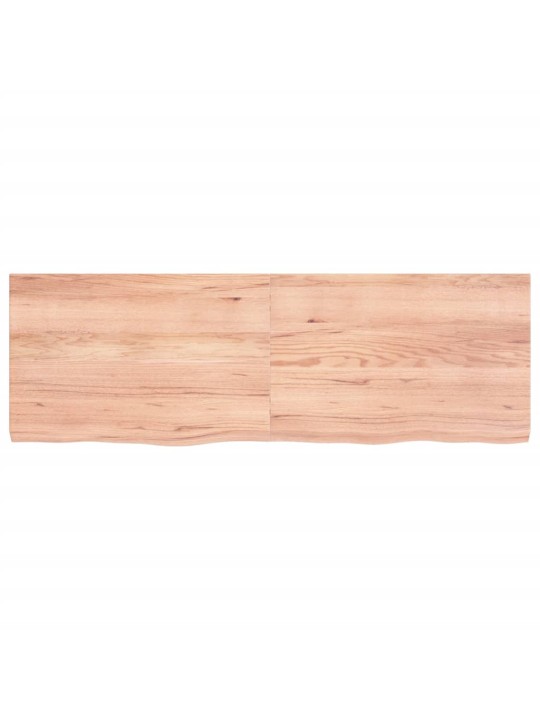 Nástěnná police hnědá 120x40x(2-4)cm ošetřený masivní dub