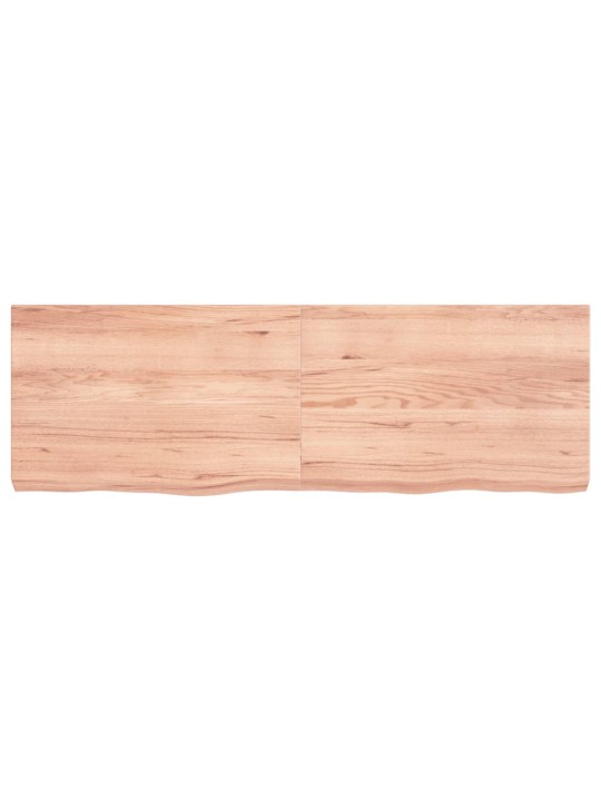 Nástěnná police hnědá 120x40x(2-6)cm ošetřený masivní dub