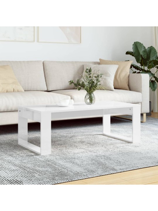 Konferenční stolek lesklý bílý 102x50x35 cm kompozitní dřevo