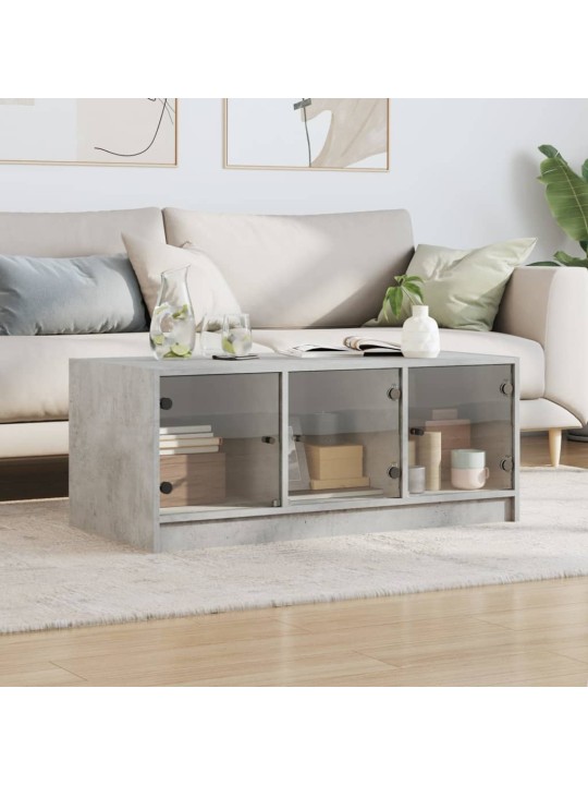 Konferenční stolek skleněná dvířka betonově šedý 102x50x42 cm