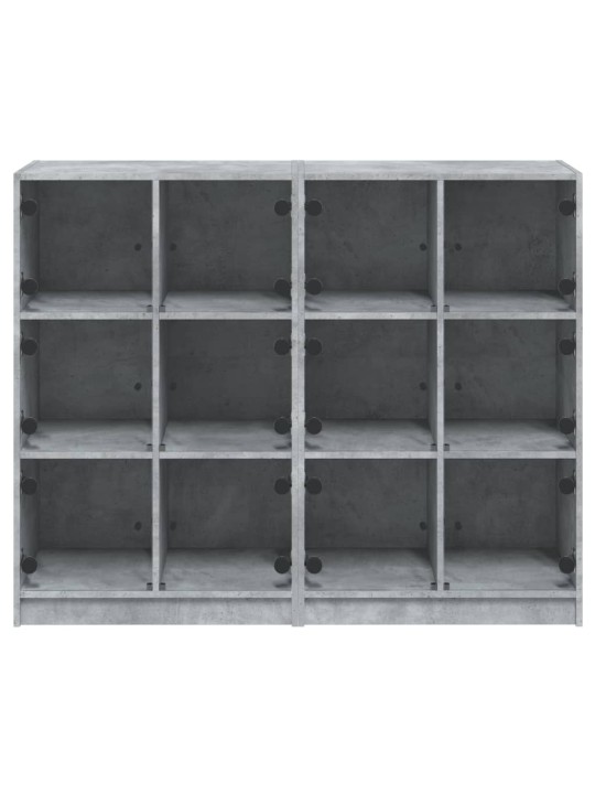 Knihovna s dvířky betonově šedá 136x37x109 cm kompozitní dřevo