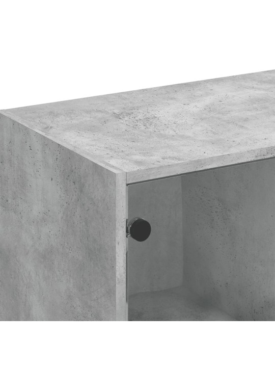 Knihovna s dvířky betonově šedá 136x37x109 cm kompozitní dřevo