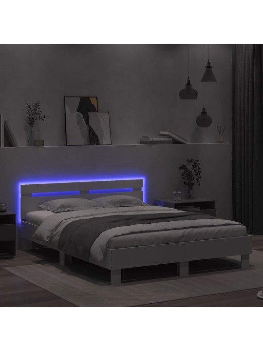 Rám postele s čelem a LED osvětlením bílý 150 x 200 cm