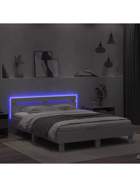 Rám postele s čelem a LED osvětlením bílý 140 x 200 cm