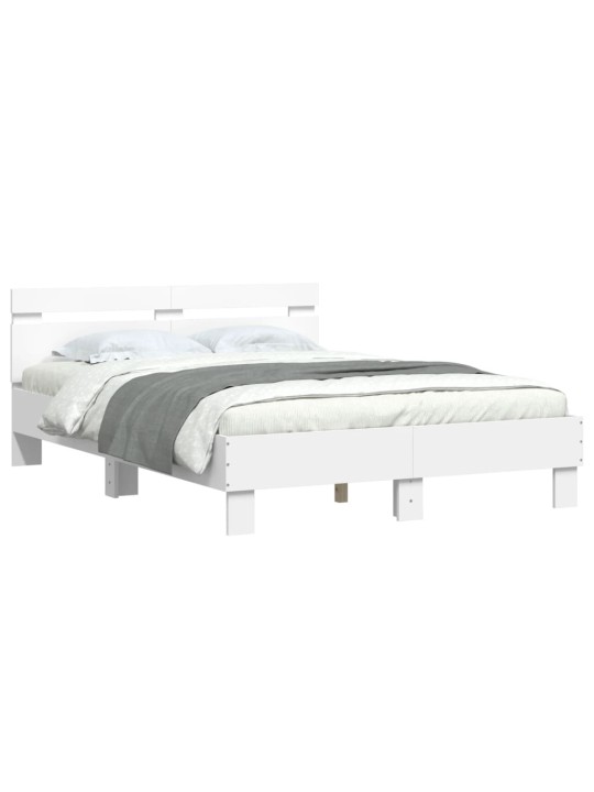 Rám postele s čelem a LED osvětlením bílý 135 x 190 cm