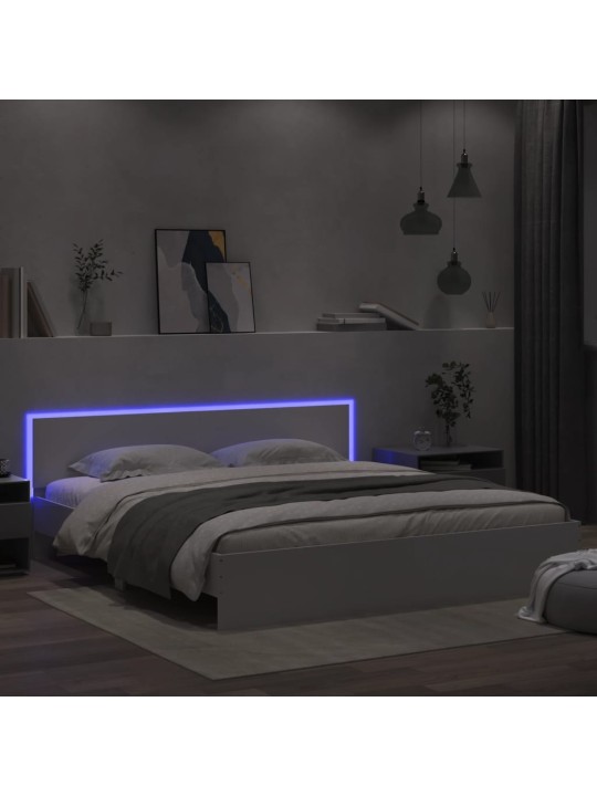 Rám postele s čelem a LED osvětlením bílý 180 x 200 cm