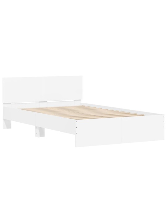 Rám postele s čelem a LED osvětlením bílý 135 x 190 cm