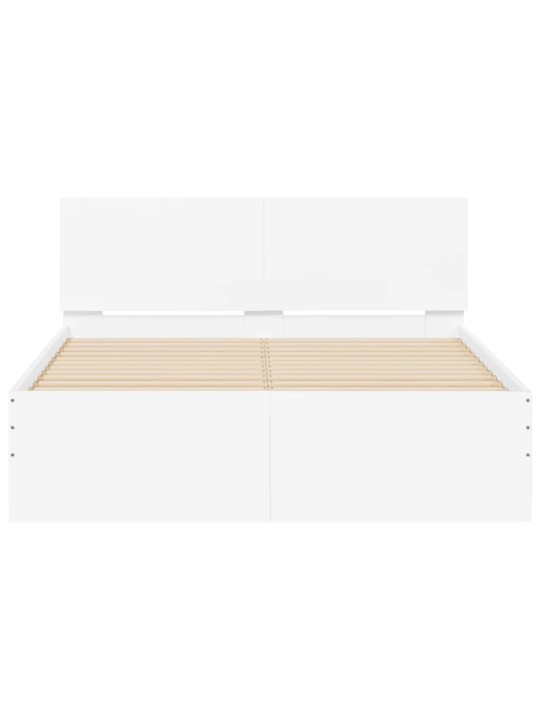 Rám postele s čelem a LED osvětlením bílý 135 x 190 cm