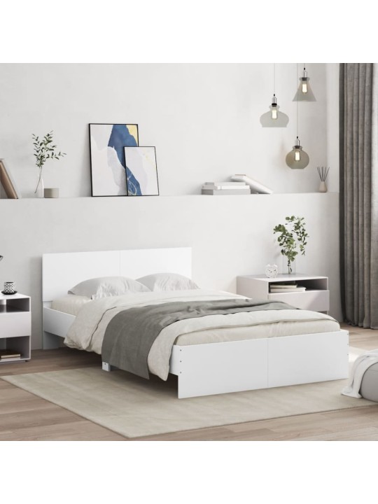 Rám postele s čelem a LED osvětlením bílý 135 x 190 cm