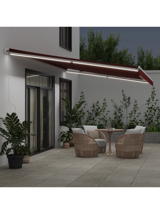 Ručně zatahovací markýza s LED burgundská 600 x 300 cm
