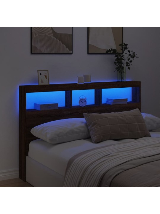 Čelo postele s úložným prostorem a led hnědý dub 160x17x102 cm