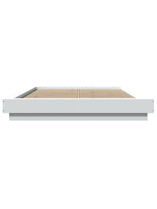 Rám postele s LED osvětlením bílý 140 x 190 cm kompozitní dřevo